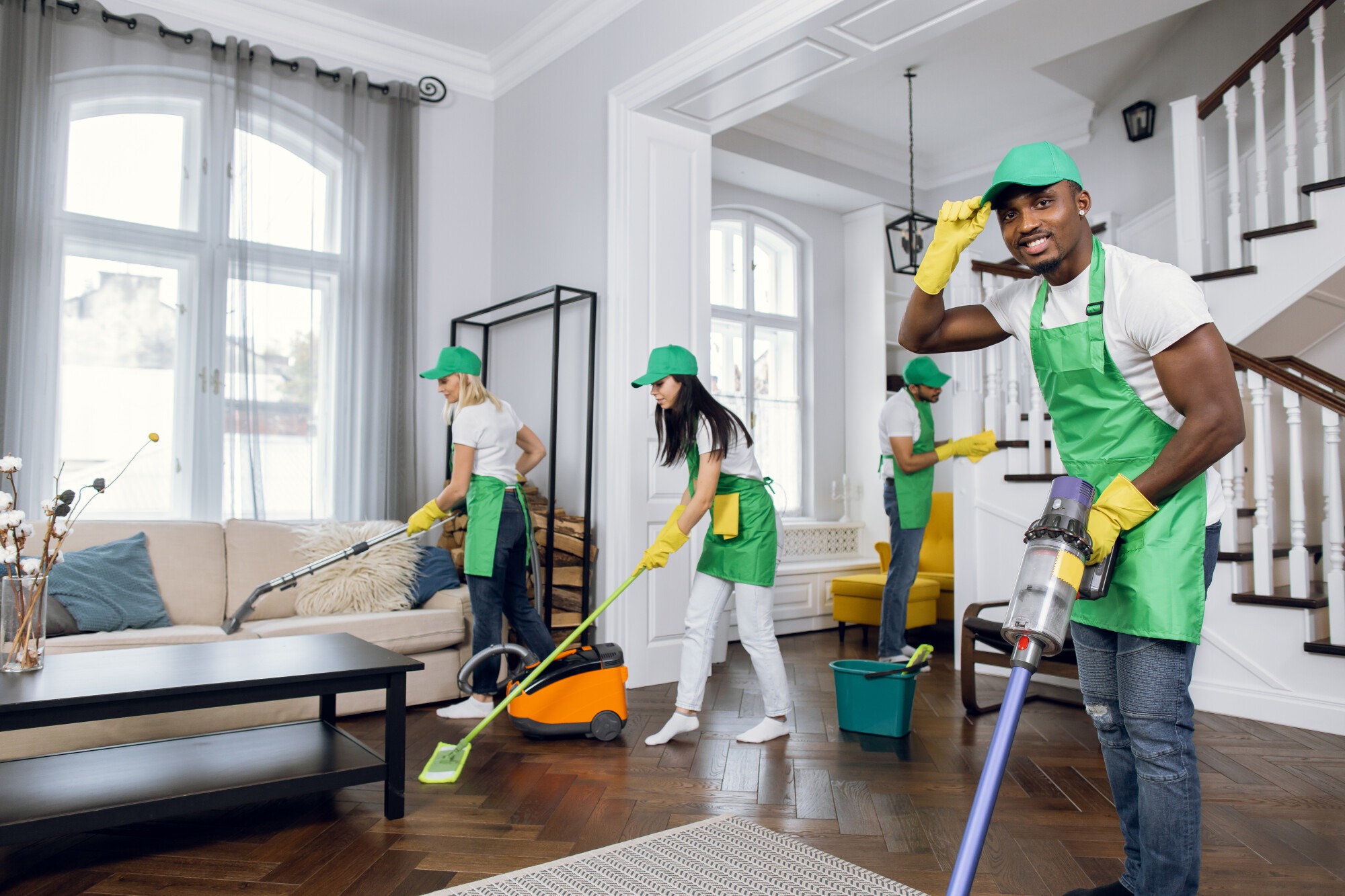 The Immaculate Interiors by DePiano cleaning team at work in a client's living room